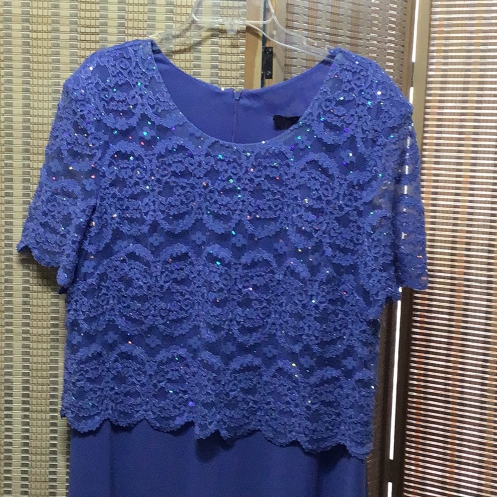 Beautiful lace top chiffon bottom periwinkle color gown. Never worn.